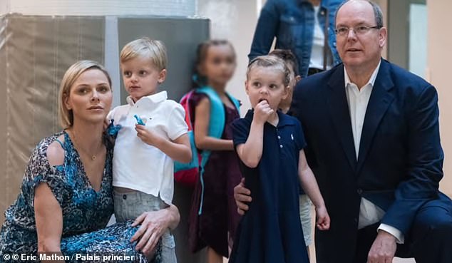 Princess Charlene and Prince Albert on Prince Jacques and Princess Gabriella's first day of school