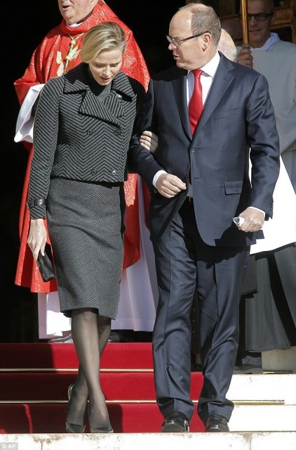 Princess Charlene of Monaco and Prince Albert II of Monaco attend the Sainte-Devote 2014