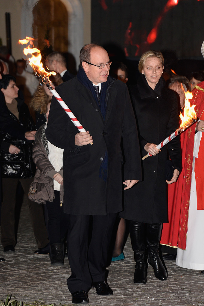 Princess Charlene of Monaco and Prince Albert II of Monaco attend the Sainte-Devote ceremony on January 26, 2014
