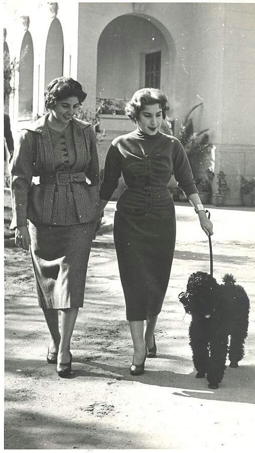 Queen Narriman walking her dog in her family home in Heliopolis in 1965.